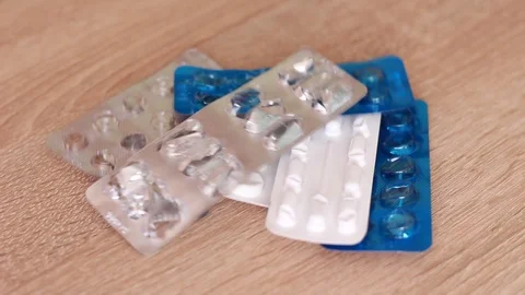 Empty pill packings on table 動画素材 86056357