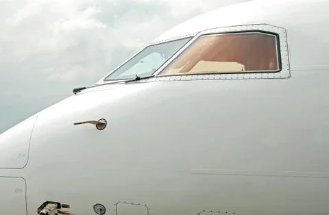 Empty pilot cabin of passenger jet airplane Stock Photos