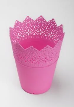 Empty pink plastic flower pot Stock Photos