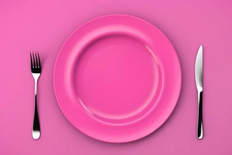 An empty pink plate on a pink table and a fork with a knife. Top view Foto stock