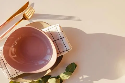 Empty pink plate on white table, Stock Photos