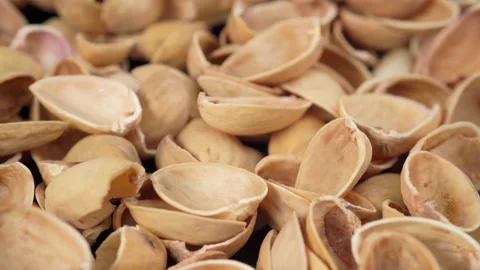 Empty pistachio nutshell. Slow motion Horizontal pan Video stock 146162272