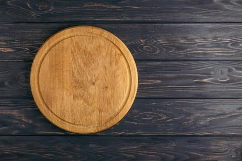 Empty pizza board. Stock Photos