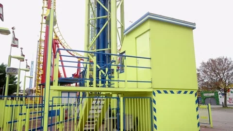 Empty place in front of a roller coaster during lockdown slow motion Video stock 143728417