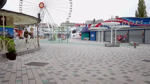 Empty place in usually crowded area in fun park during lockdown Stock Footage 143726309