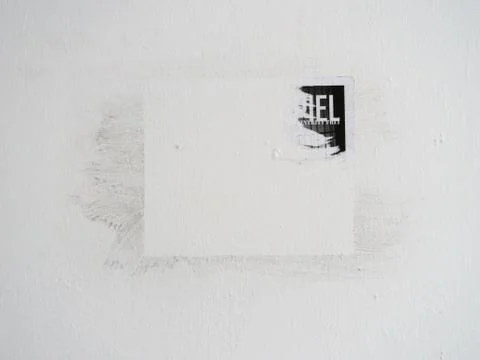 Empty place on the wall with the rest of the poster Stock Photos