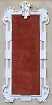 Empty plaster frame stucco on the facade of the building in retro style Stock Photos