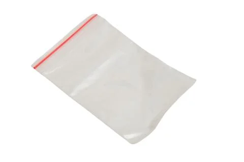 Empty plastic bag with red zipper lock. Transparent polythene pouch for sto.. 스톡 사진