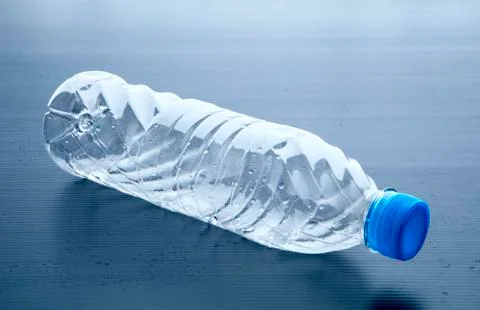 Empty plastic bottle lying on gray background 写真素材