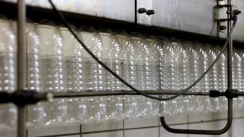 Empty Plastic bottle at Water bottling factory line up in processing mineral Stock Footage 334587528