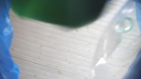 Empty plastic bottles are thrown into the bin for further recycling, bottom view Stock Footage 102429073
