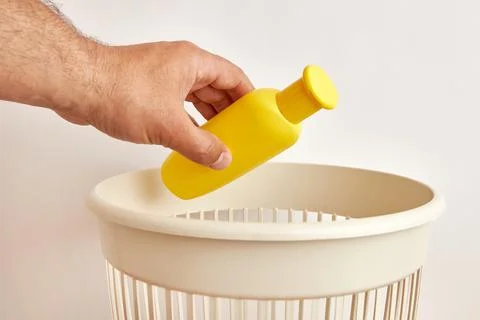 Empty plastic bottles are thrown away for disposal and recycling. Stock Photos
