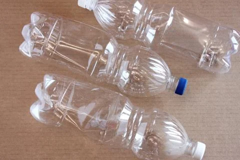 Empty plastic bottles. The concept of environmental pollution. Stock Photos