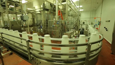 Empty plastic bottles. On conveyor belt in plant G Video stock 102185603