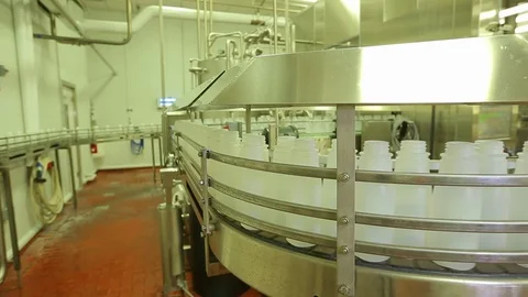 Empty plastic bottles. On conveyor belt in plant C Stock Footage 102567153