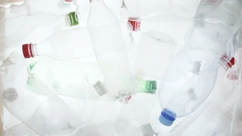 Empty plastic bottles falling down. Water PET bottle recycling plastic water Stock Footage 195376383