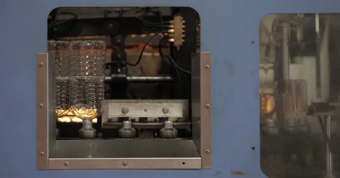 Empty Plastic Bottles From Industrial Machine Stock Footage 61386942