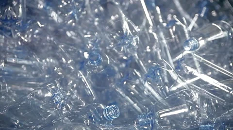 Empty plastic bottles for water are moving on the conveyor Video stock 63213616
