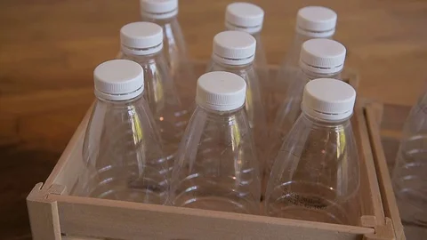 Empty plastic bottles in wooden crates. Stock Footage 129506281