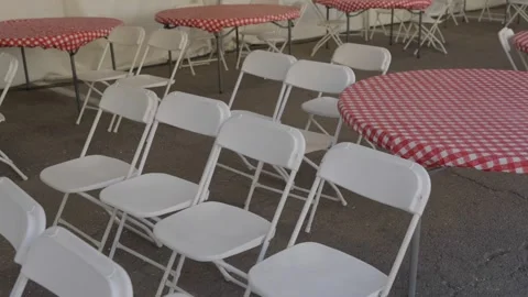 Empty plastic chairs and tables in tent Stock Footage 288901291