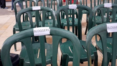 Empty plastic chairs ready before an outdoor event Stock Footage 117044183