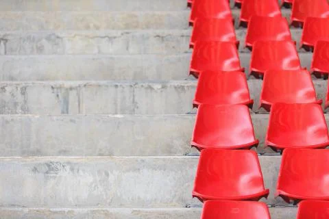 Empty Plastic Chairs at the Stadium Stock Photos