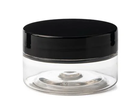 Empty plastic container for cosmetics isolated on white Stock Photos