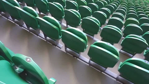 Empty plastic seats in a stadium. Matches to be played without fans. Stock Footage 126208599