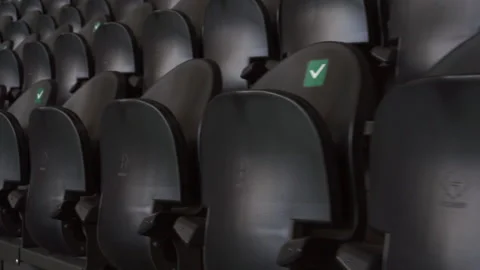 Empty plastic seats in a stadium. Matches to be played without fans. Stock Footage 193986940
