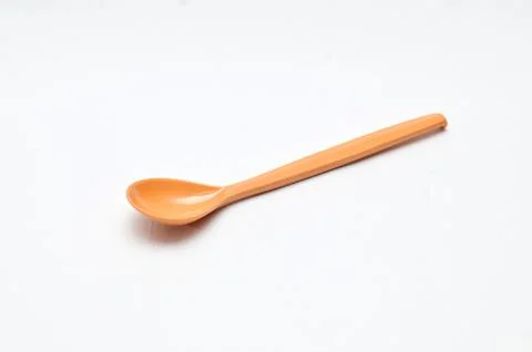Empty plastic spoon Stock Photos