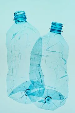 Empty plastic squashed bottles collected to recycling Foto stock