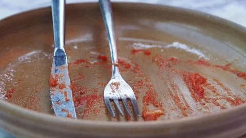 Empty plate after meal at outdoor restaurant Stock Footage 323425594