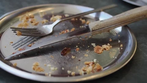 Empty plate after a meal at a restaurant Stock Footage 332750946