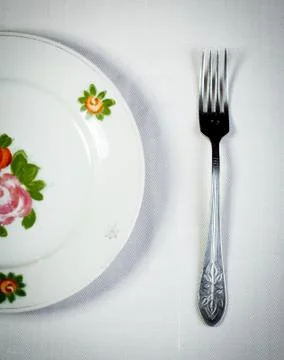 Empty plate and fork Foto stock