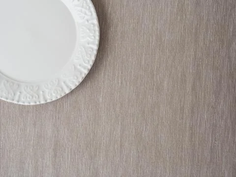 Empty plate on beige background Stock Photos
