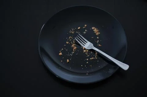 Empty plate with breadcrumbs Stock Photos