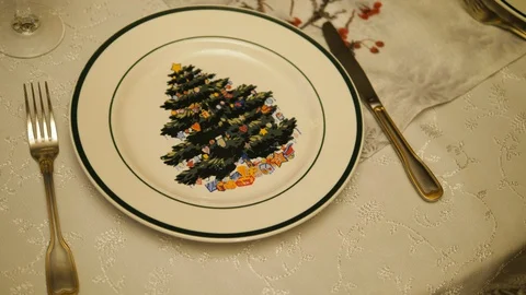 Empty Plate Christmas tree and golden cutlery on Dining table. Family house. Stock Footage 129042327