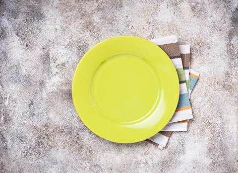 Empty plate on concrete table Stock Photos