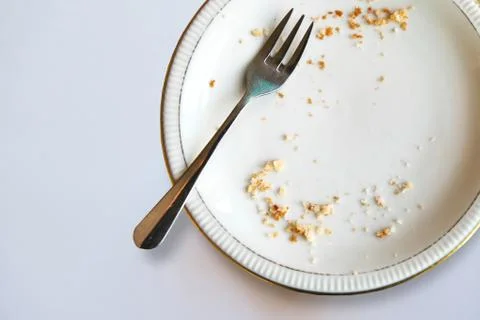 Empty plate with crumbs Stock Photos