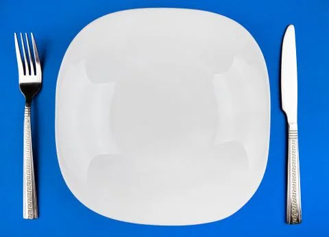 Empty Plate with a Cutlery Stock Photos