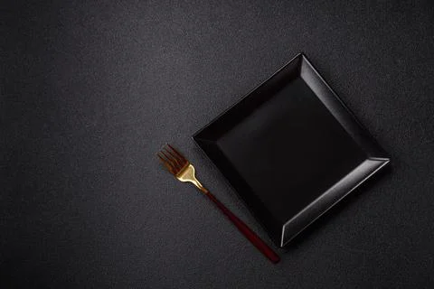 Empty plate with fork, cutlery for dinner table Stock Photos