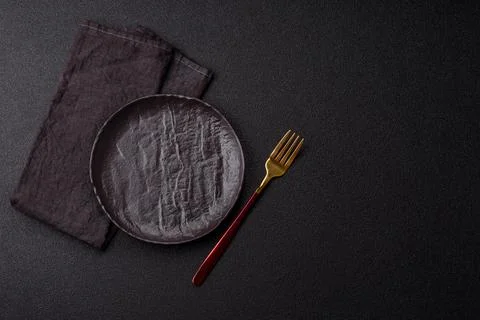 Empty plate with fork, cutlery for dinner table Stock Photos