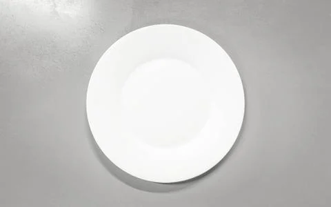 Empty plate on grey concrete background. Top view with copy space 3d render Illustrazione stock