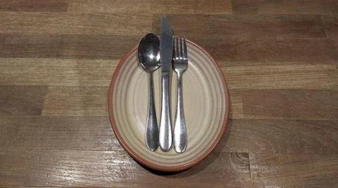 Empty Plate Or Dish With Knife, Fork And Spoon Stock-Fotos