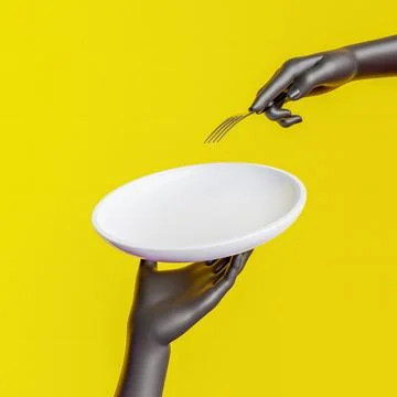 Empty plate for product display held by hand with a fork Stock Photos