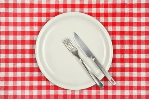 Empty plate on restaurant table Foto stock
