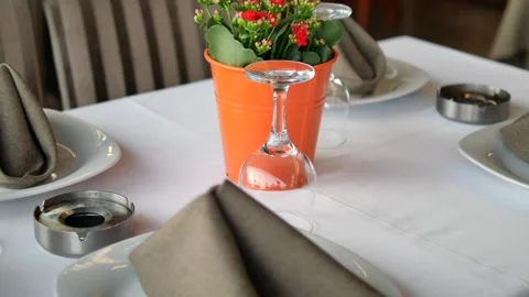 Empty plate, silverware and towel on table Stock Footage 258531668