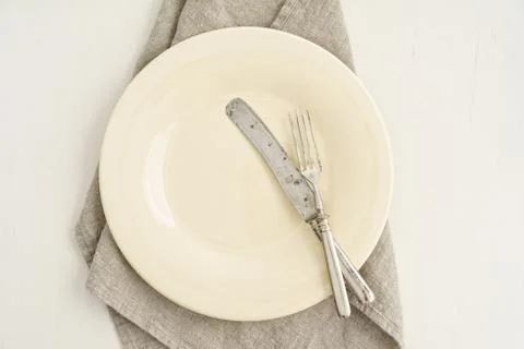 Empty plate with silverware Stock Photos