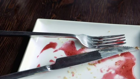 Empty plate smeared with fruit syrup Stock Footage 71840977
