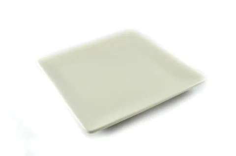 Empty plate square isolated on white background Foto stock